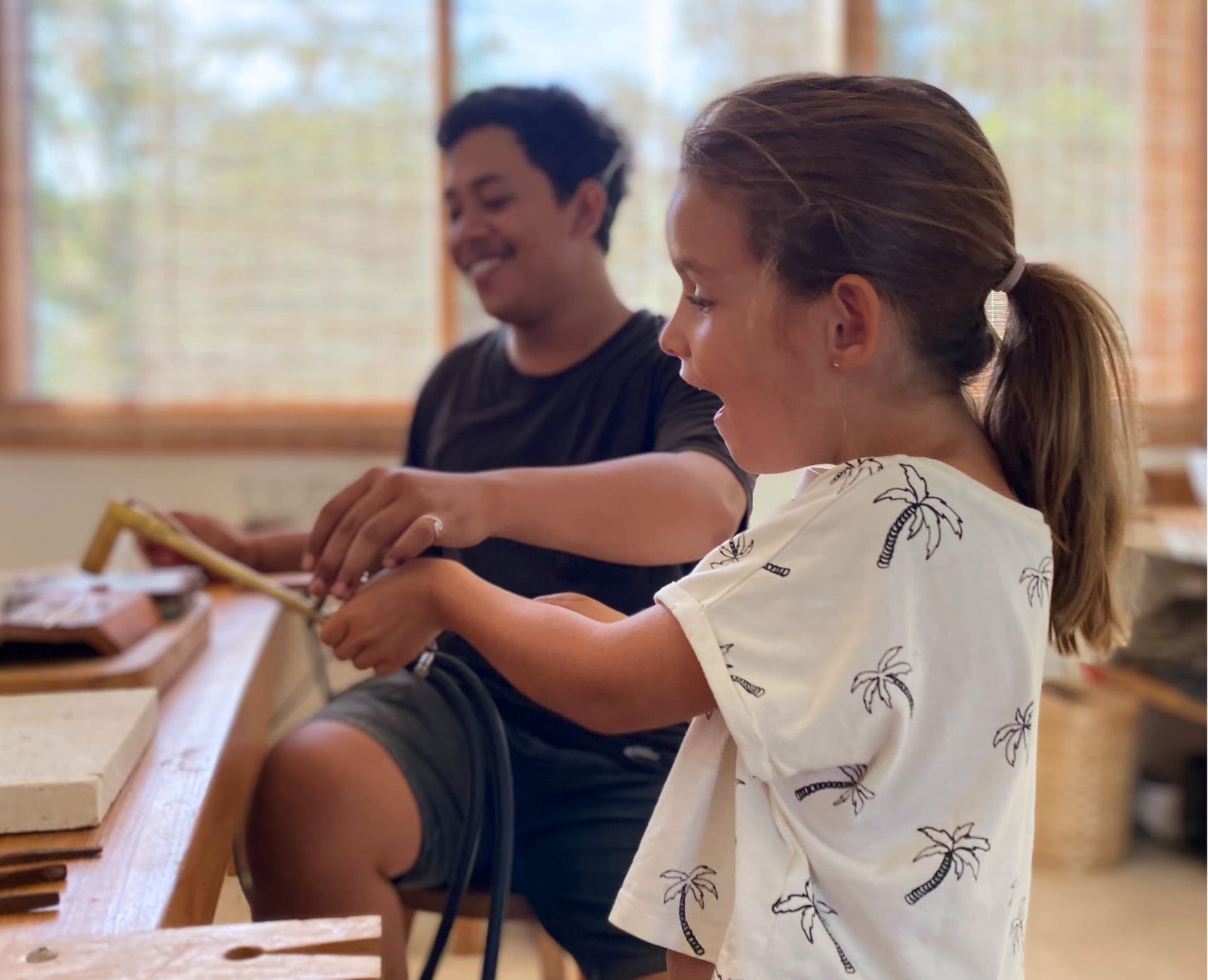 Children taking part in a silver jewelry workshop at Bingin Silver Class Seminyak