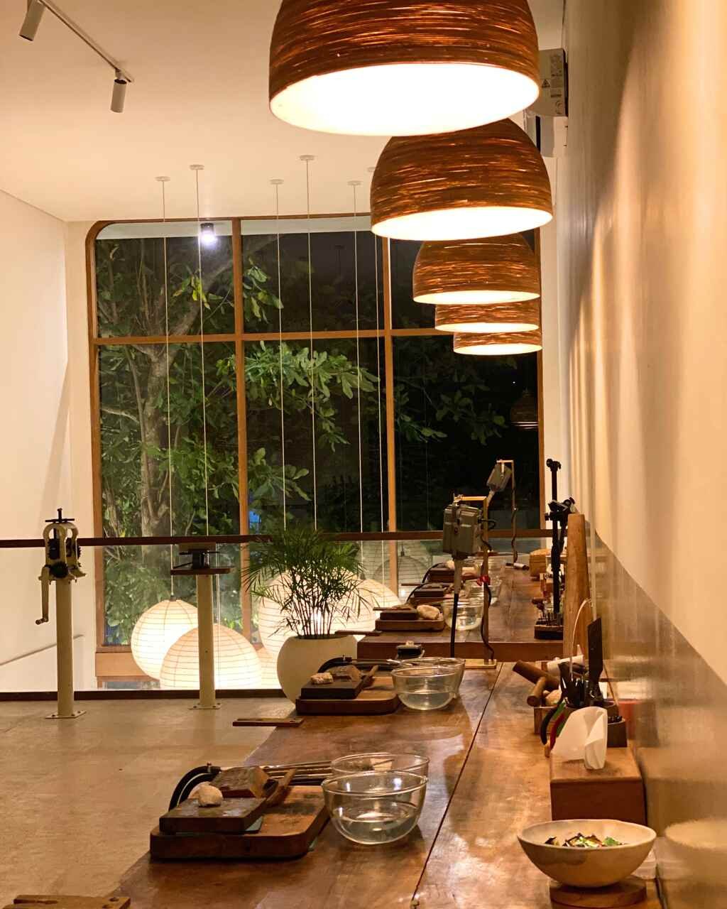 Studio entrance surrounded by tropical plants