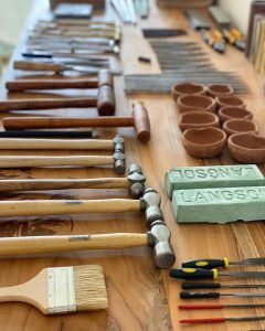 Tools neatly arranged at beginner’s table