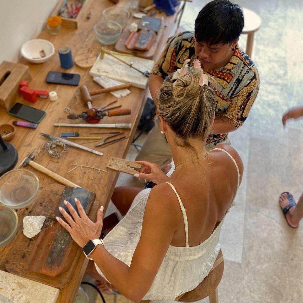 Participant crafting her own ring during Uluwatu Silver Class in Bali.