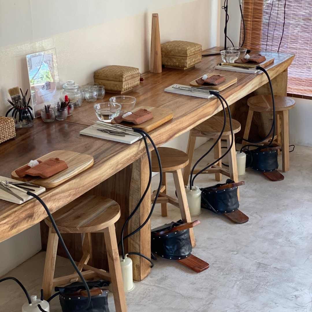 a table with stools and objects on it