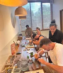 Group of participants learning silversmith techniques at silver making class Ubud.