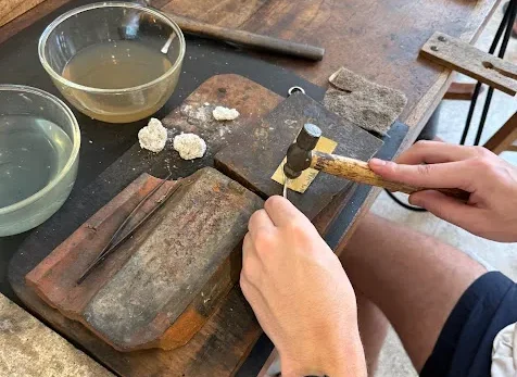 Creating custom silver rings during a Seminyak Silver Class workshop in Bali.