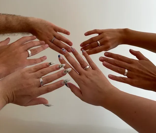 Group showcasing finished handmade silver rings at the Uluwatu Silver Class workshop.
